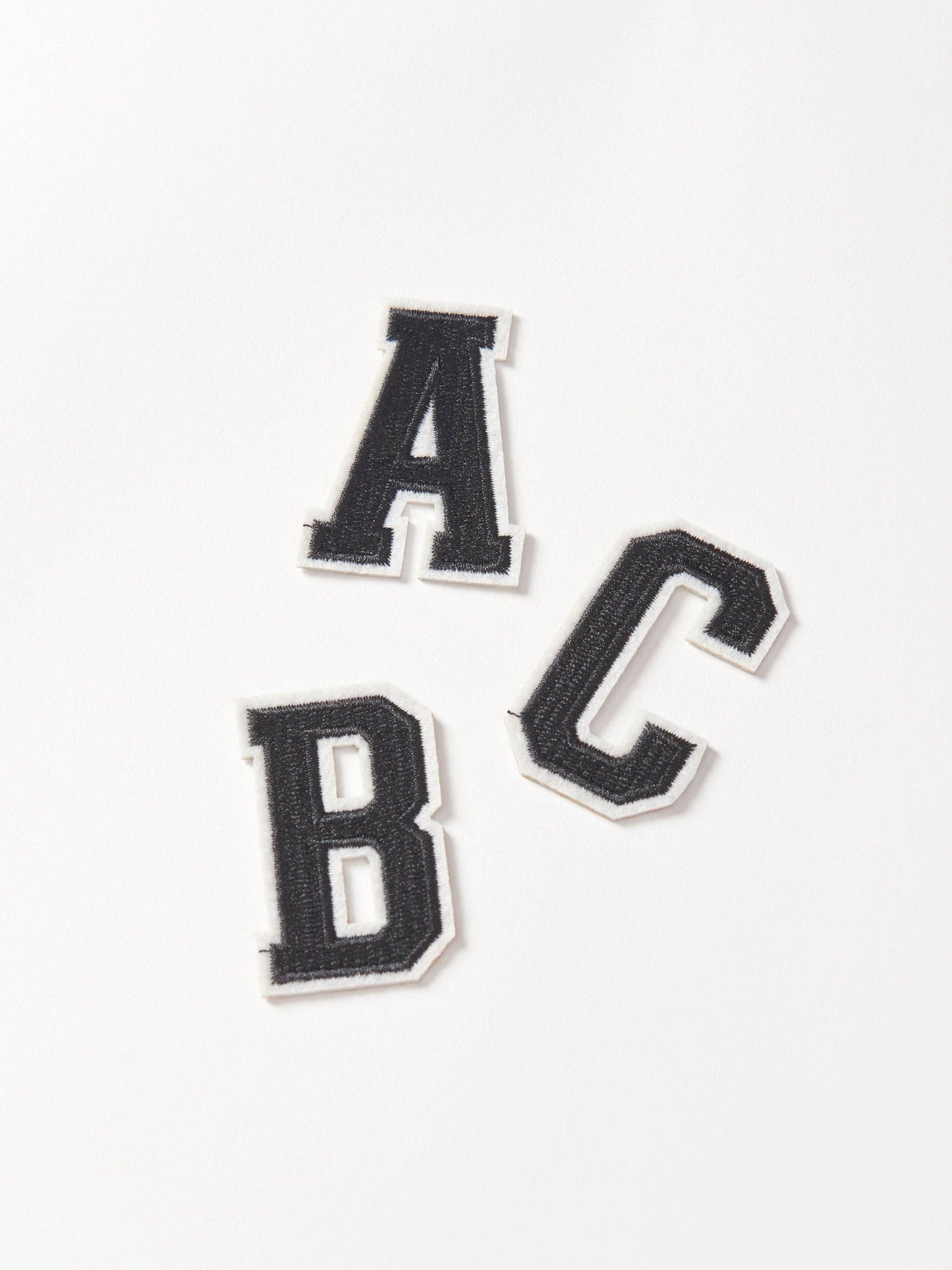 Black Varsity Letter Patch