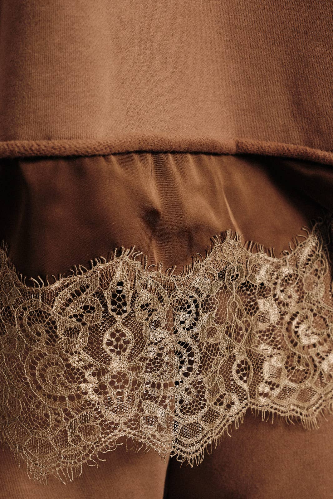 Round Neck Lace Trimmed Hem Long Sleeve Sweatshirt